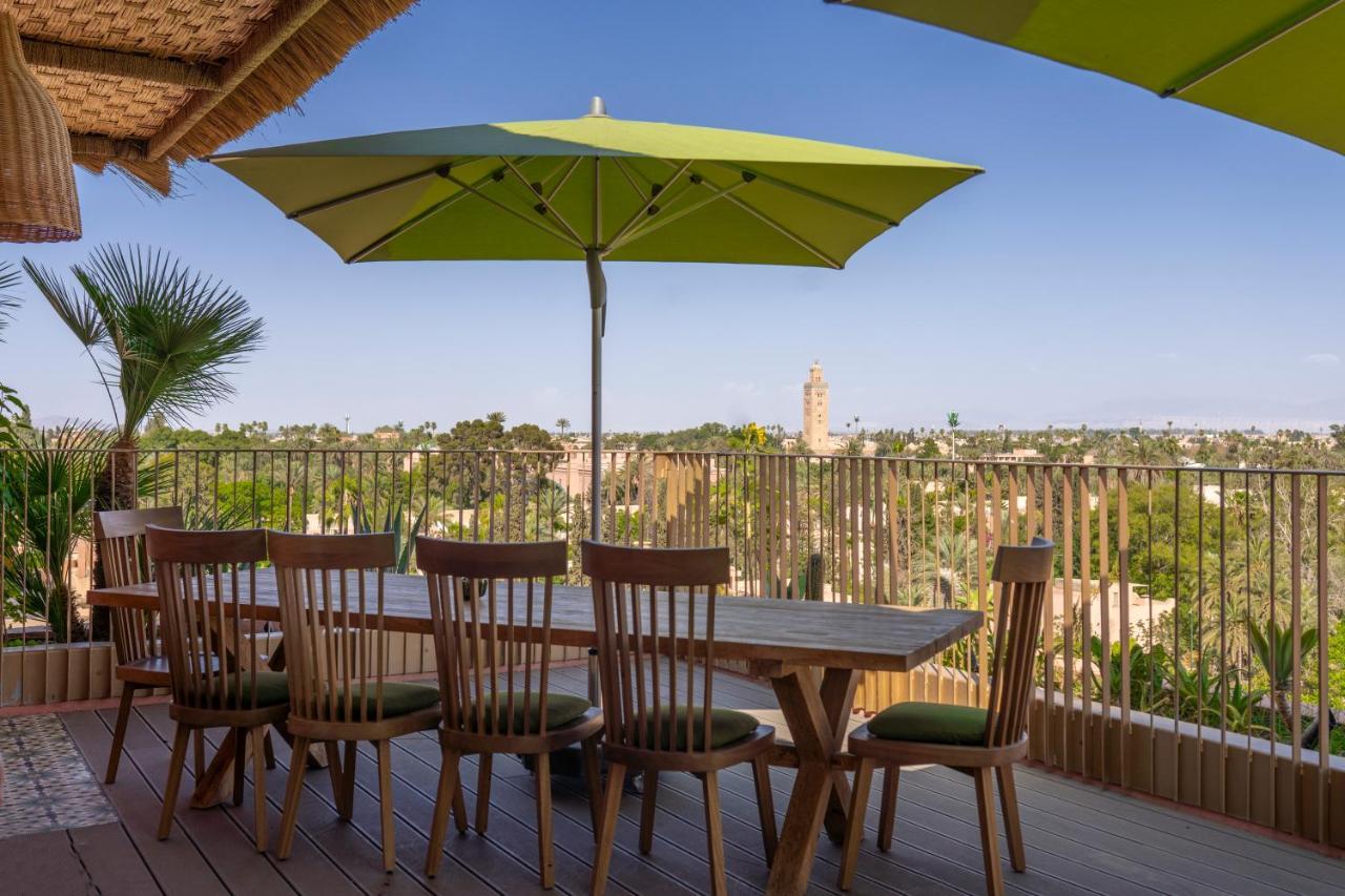 Hotel Jadali & Spa Marraquexe Exterior foto A patio umbrella