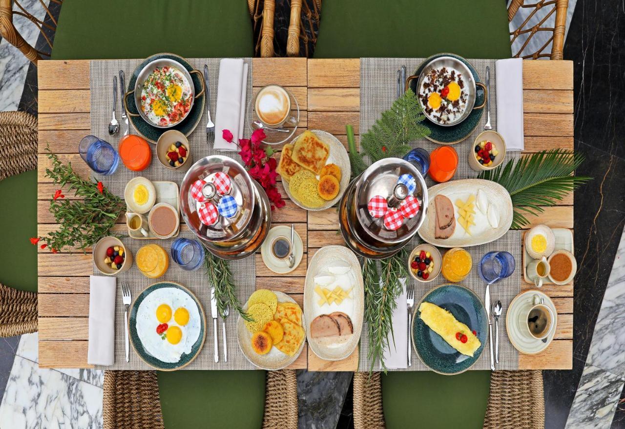 Hotel Jadali & Spa Marraquexe Exterior foto A typical breakfast table
