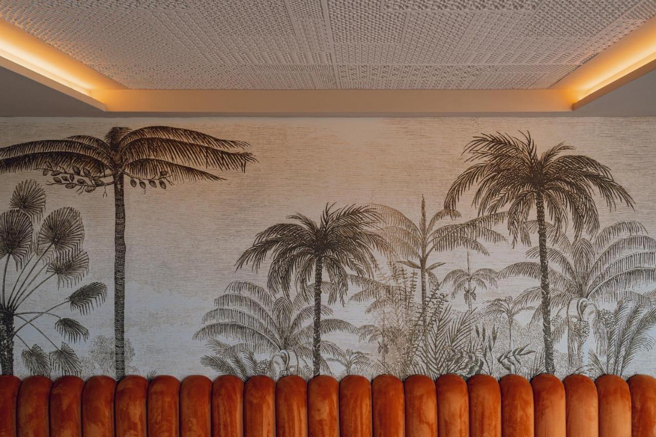 Hotel Jadali & Spa Marraquexe Exterior foto Palm trees on the wall of the lobby
